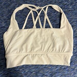 Buffbunny off white revolution sports bra. Size medium. Cup pads NOT included.